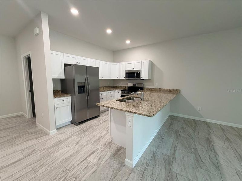 Furnished interior view inside a new home in , Port Charlotte (Image 11). Furnished interior view inside a new home in , Port Charlotte (Image 11).