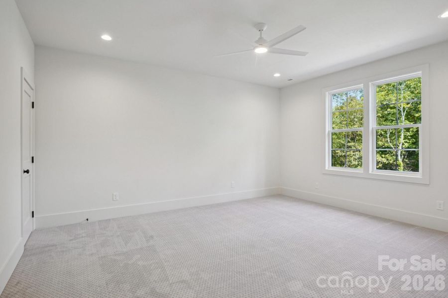 Spacious, unfurnished interior of a new home in , Huntersville (Image 40).