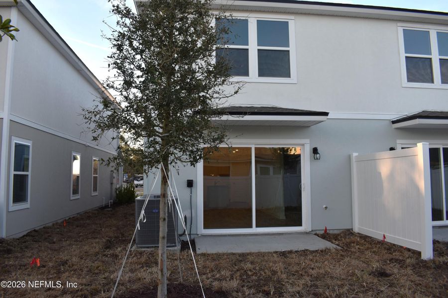 Exterior details and patio area of a home in Irongate Villas, Jacksonville (Image 3).