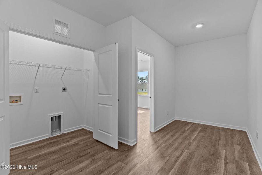 Spacious, unfurnished interior of a new home in Coastal Haven, Leland (Image 11). Spacious, unfurnished interior of a new home in Coastal Haven, Leland (Image 11).