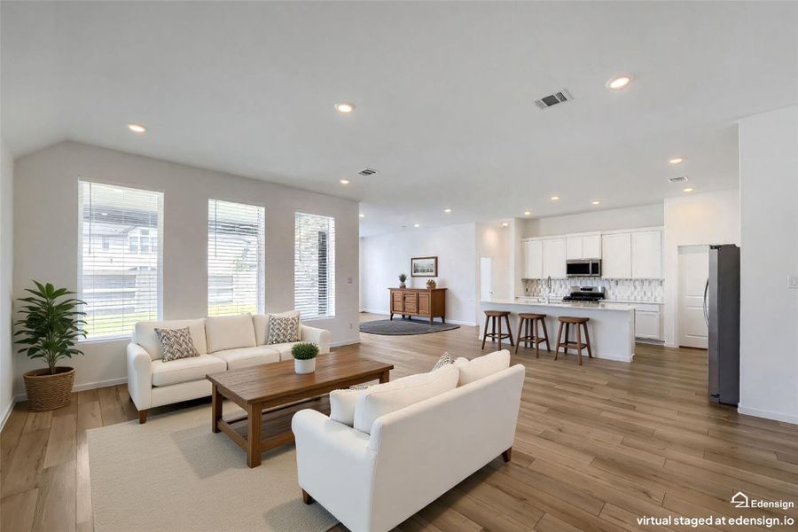 Spacious, virtually staged open-concept living area withnatural light. Perfect for entertaining.