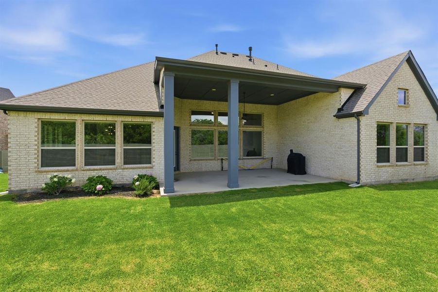 Relax Or Entertain On The Sizable Covered Patio, Complete With Lighting And Ceiling Fan.