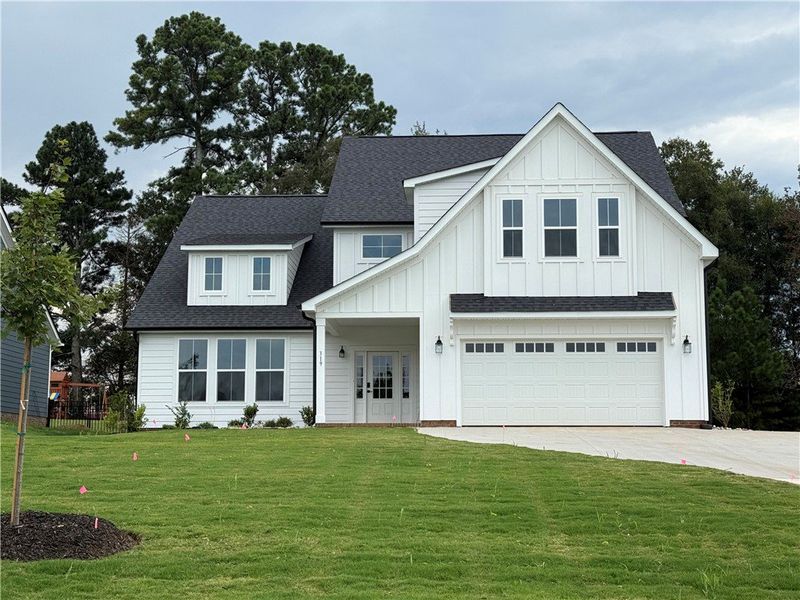 Front exterior of a new home in Walker's Pointe, Anderson, SC, highlighting curb appeal (Image 1).