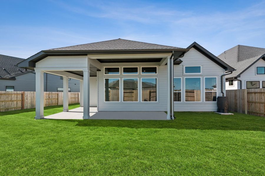 Exterior details and patio area of a home in ARTAVIA 50' Homesites, Conroe (Image 3).