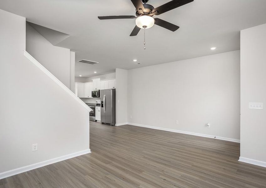 The living room connects to the kitchen.