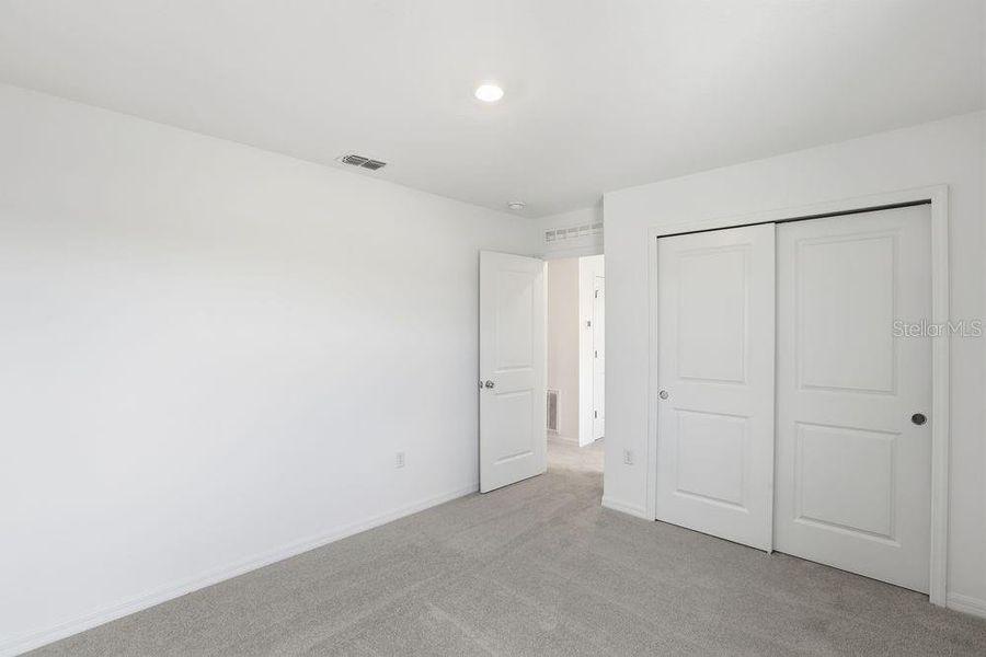 Spacious, unfurnished interior of a new home in Waterstone, Groveland (Image 36).