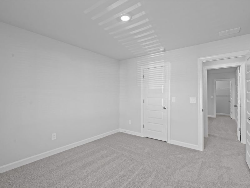 Spacious, unfurnished interior of a new home in The Farm at Wells Creek - Signature Collection, Gray Court (Image 17).