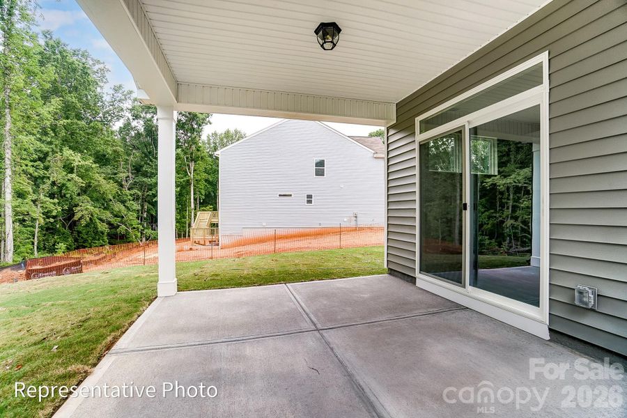 Exterior details and patio area of a home in Enclave at Riverdale, Huntersville (Image 3).