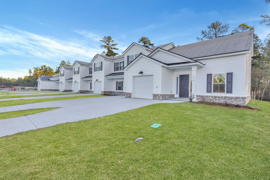 Representative exterior photo of a completed home built from the New Haven Town A by Ernest Homes in New Haven At Belmont Glen, Guyton, GA (Image 2). Representative exterior photo of a completed home built from the New Haven Town A by Ernest Homes in New Haven At Belmont Glen, Guyton, GA (Image 2).