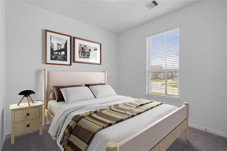 Secondary bedroom features plush carpet, neutral paint, lighting, large window with privacy blinds and ample sized closet space.