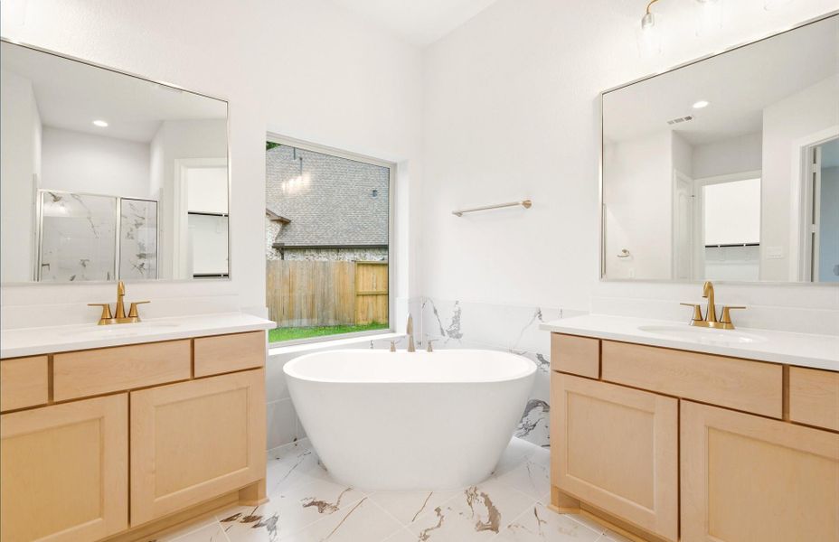 Furnished interior view inside a new home in The Woodlands Hills 65′, Willis (Image 27).
