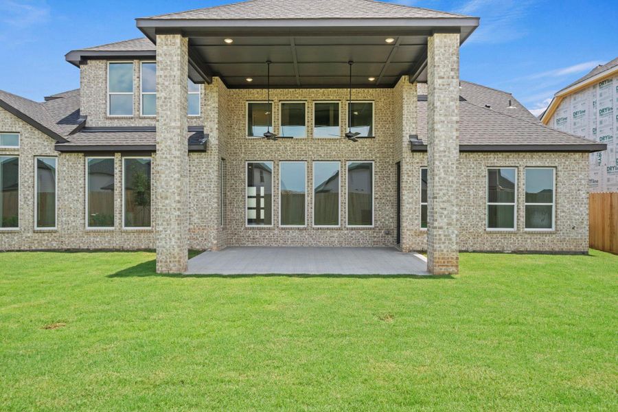 Exterior details and patio area of a home in Harvest Green, Richmond (Image 3). Exterior details and patio area of a home in Harvest Green, Richmond (Image 3).