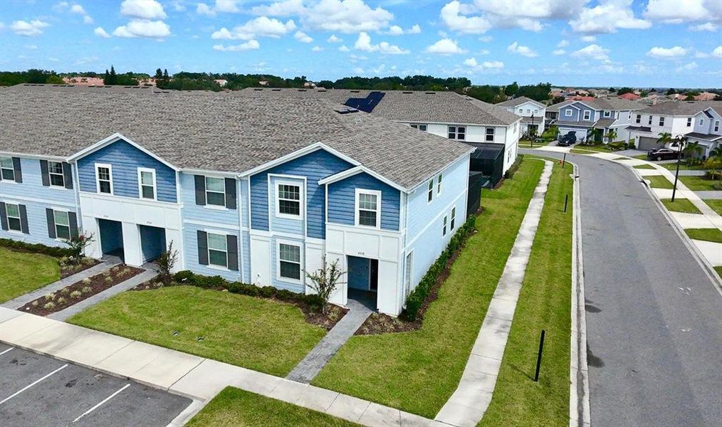 Front exterior of a new home in , Davenport, FL, highlighting curb appeal (Image 18).