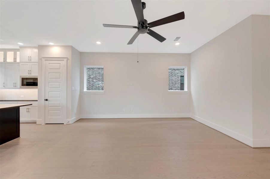 Spacious, unfurnished interior of a new home in Easthaven at Bridgeland Central - Vision Collection, Cypress (Image 12).