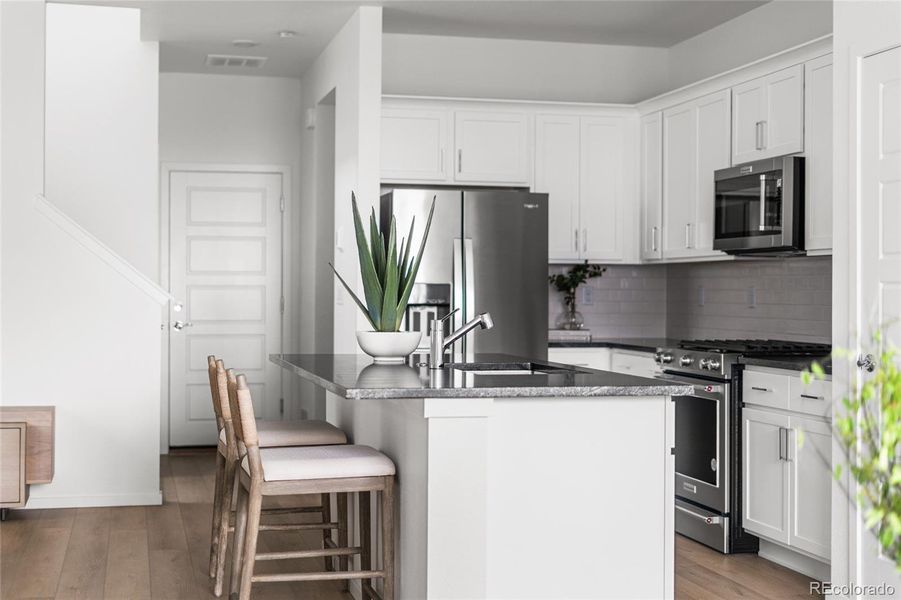 Furnished interior view inside a new home in Painted Prairie, Aurora (Image 15).