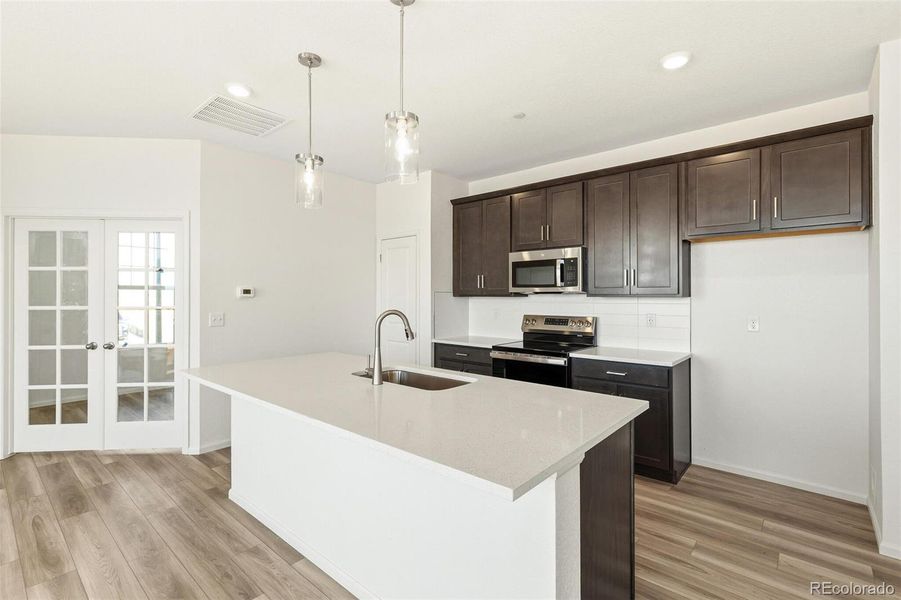 Furnished interior view inside a new home in Turnberry, Commerce City (Image 13).