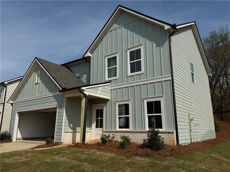 Front exterior of a new home in Langston Reserve, Cartersville, GA, highlighting curb appeal (Image 2). Front exterior of a new home in Langston Reserve, Cartersville, GA, highlighting curb appeal (Image 2).