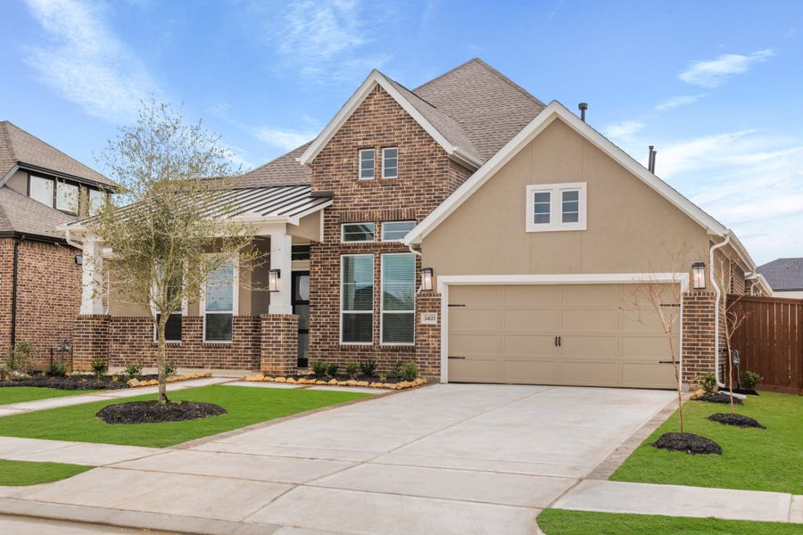 Front exterior of a new home in Elyson, Katy, TX, highlighting curb appeal (Image 18). Front exterior of a new home in Elyson, Katy, TX, highlighting curb appeal (Image 18).
