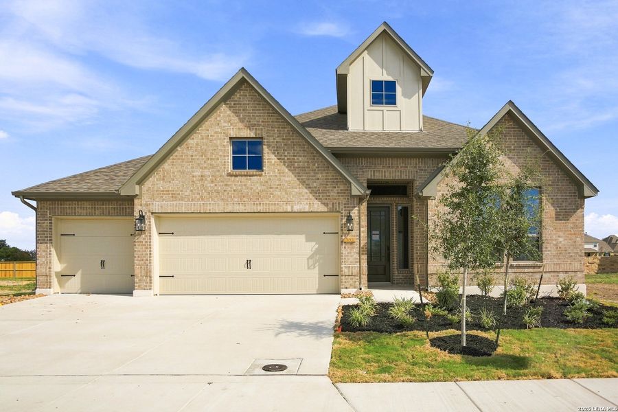 Front exterior of a new home in Legacy at Lake Dunlap, New Braunfels, TX, highlighting curb appeal (Image 2). Front exterior of a new home in Legacy at Lake Dunlap, New Braunfels, TX, highlighting curb appeal (Image 2).