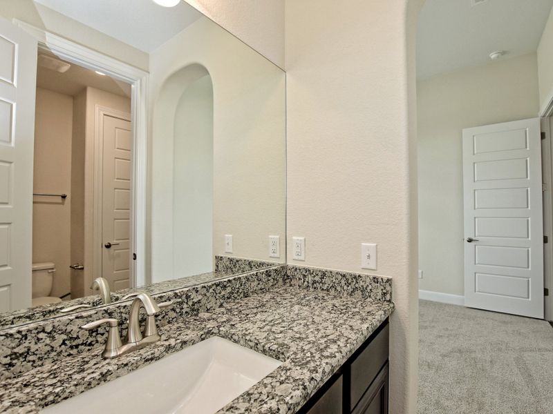 Representative furnished interior of a home built from the San Simeon I by Giddens Homes in Clearwater Ranch, Liberty Hill (Image 340).