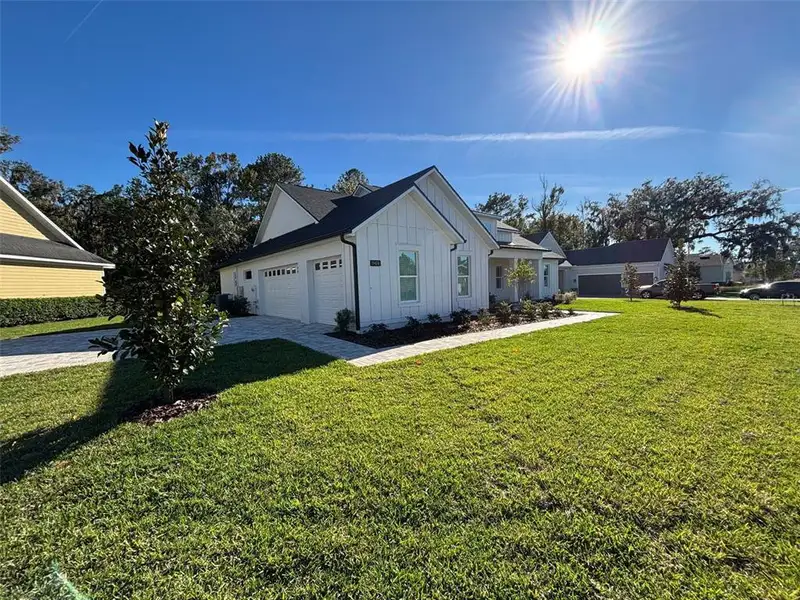 Exterior details and patio area of a home in , Brooksville (Image 2).