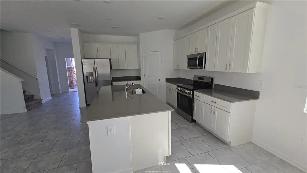 Furnished interior view inside a new home in Rhett's Ridge, Apopka (Image 6).