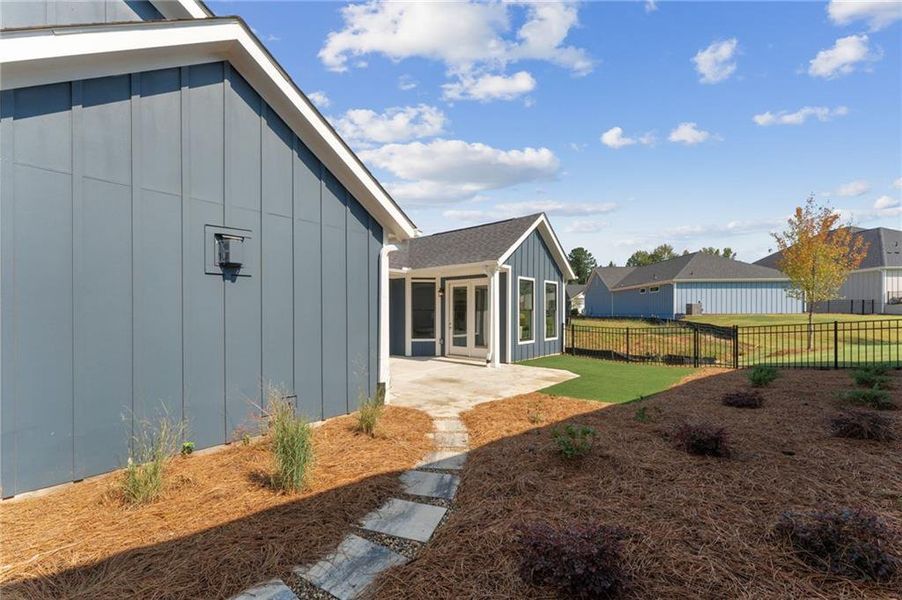 Front exterior of a new home in The Courtyards at Redbud Lane, Canton, GA, highlighting curb appeal (Image 18).