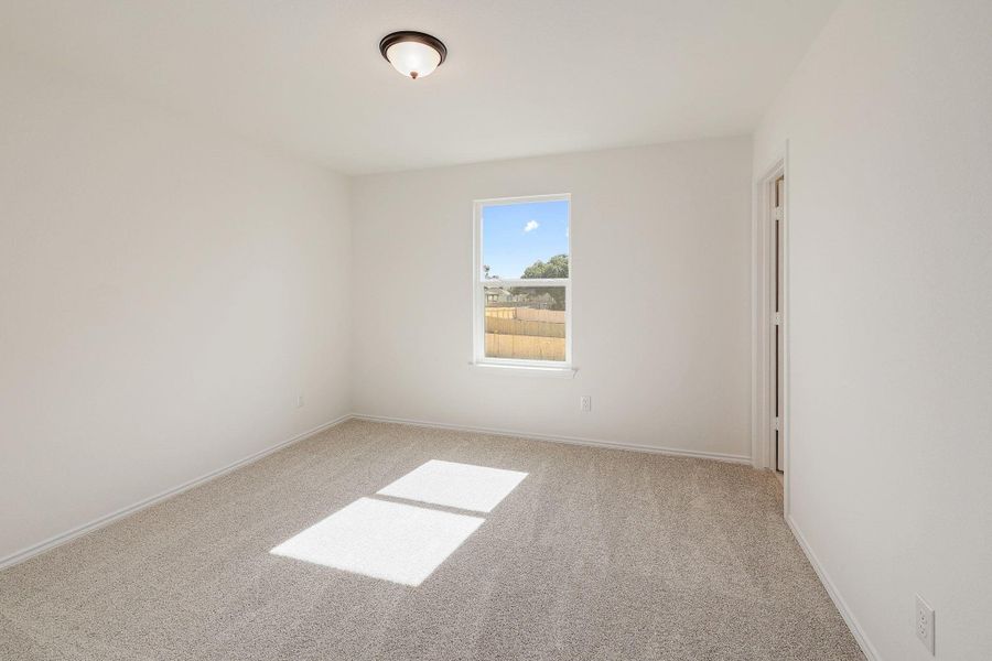 Spacious, unfurnished interior of a new home in River Bluff, Leander (Image 14).
