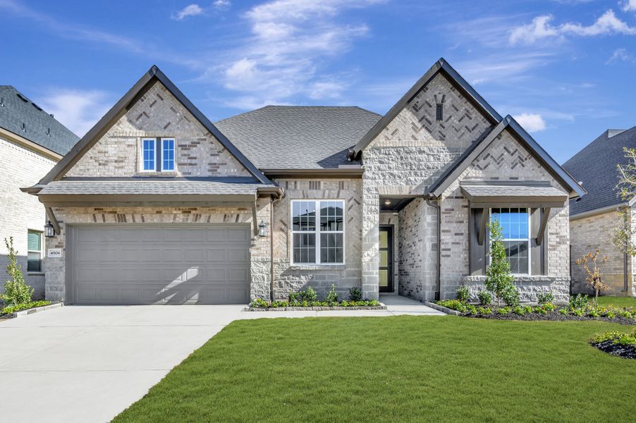 Front exterior of a new home in Brookewater - Ascent Collection, Rosenberg, TX, highlighting curb appeal (Image 1). Front exterior of a new home in Brookewater - Ascent Collection, Rosenberg, TX, highlighting curb appeal (Image 1).