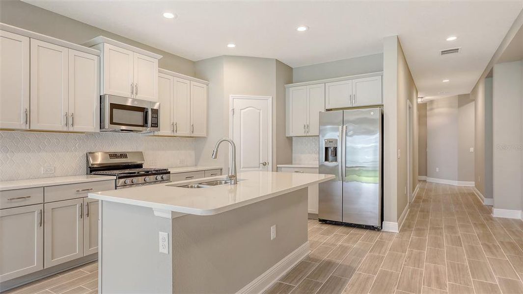 Furnished interior view inside a new home in Wildleaf, Parrish (Image 6).