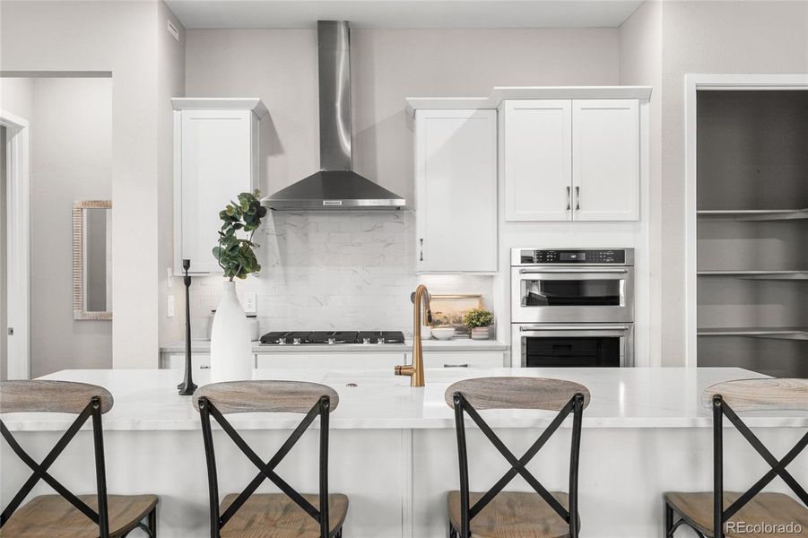 Furnished interior view inside a new home in Hilltop at Inspiration, Aurora (Image 24).