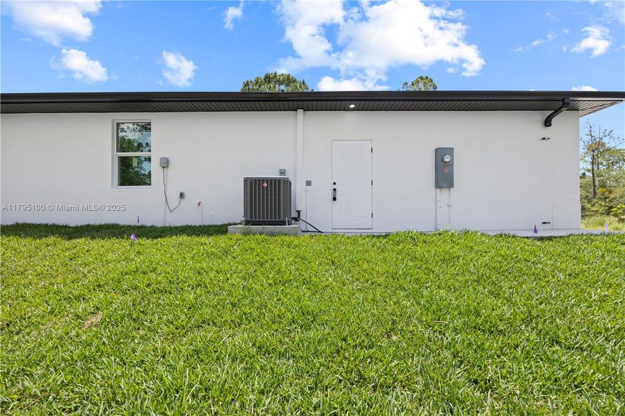 Exterior details and patio area of a home in , Lehigh Acres (Image 1).