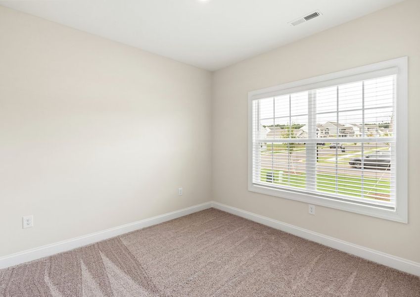 The secondary bedroom is spacious!