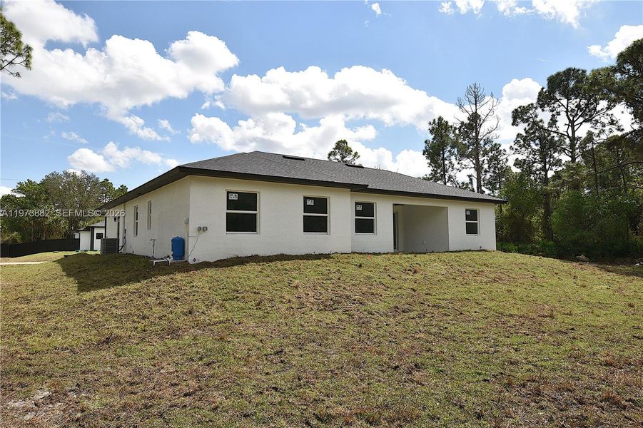 Exterior details and patio area of a home in , Lehigh Acres (Image 18).