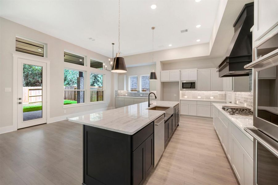 Furnished interior view inside a new home in The Woodlands Hills - Premier Collection, Willis (Image 7). Furnished interior view inside a new home in The Woodlands Hills - Premier Collection, Willis (Image 7).