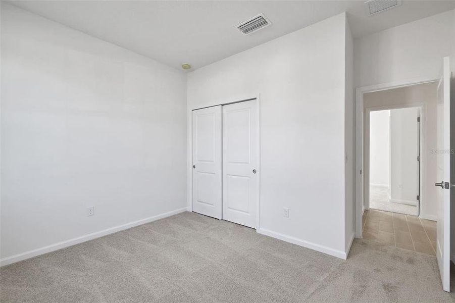 Spacious, unfurnished interior of a new home in Brystol North at Wylder, Port St. Lucie (Image 22).