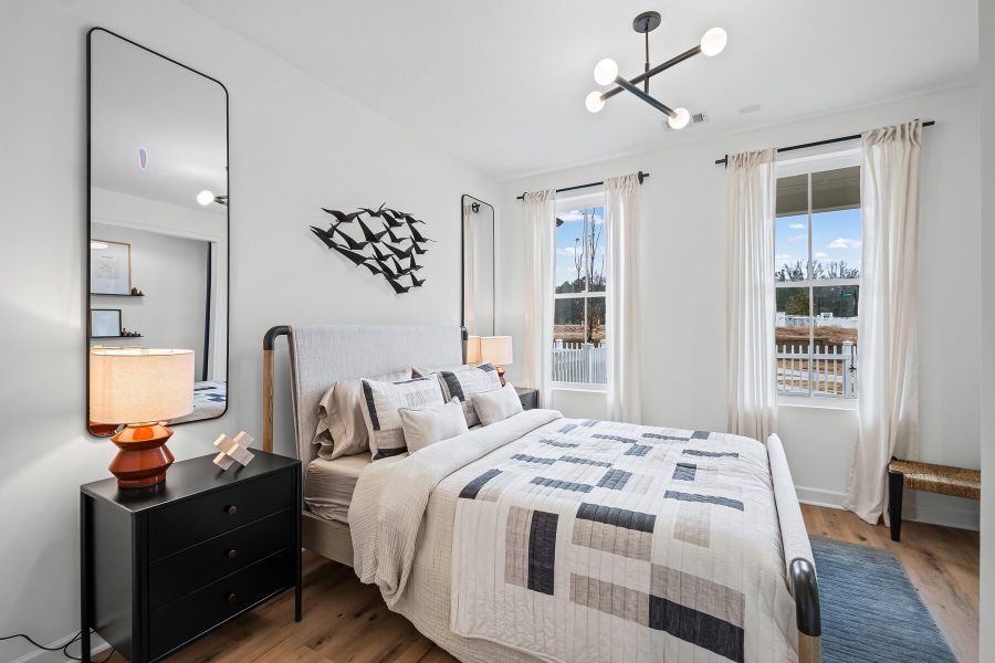 Representative furnished interior of a home built from the The Greenfield by JW Collection in The Village at River Green, Canton (Image 7).