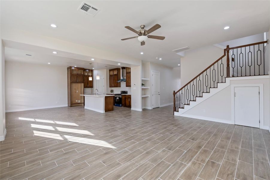 Open concept living with high ceilings.