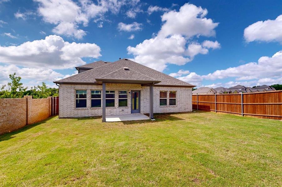 Front exterior of a new home in Kings Way, Denton, TX, highlighting curb appeal (Image 19). Front exterior of a new home in Kings Way, Denton, TX, highlighting curb appeal (Image 19).
