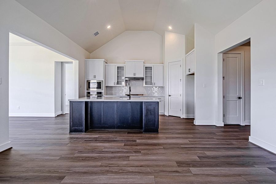 The spacious layout provides effortless flow between the kitchen, dining area, and family room for comfortable daily living The spacious layout provides effortless flow between the kitchen, dining area, and family room for comfortable daily living