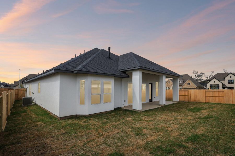 Exterior details and patio area of a home in Sienna 65', Missouri City (Image 3).
