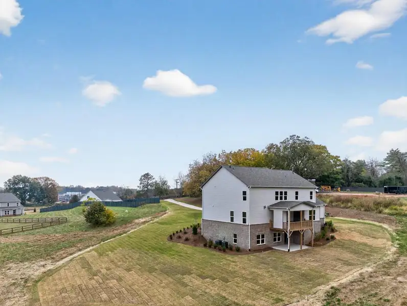 Front exterior of a new home in , Gainesville, GA, highlighting curb appeal (Image 33).