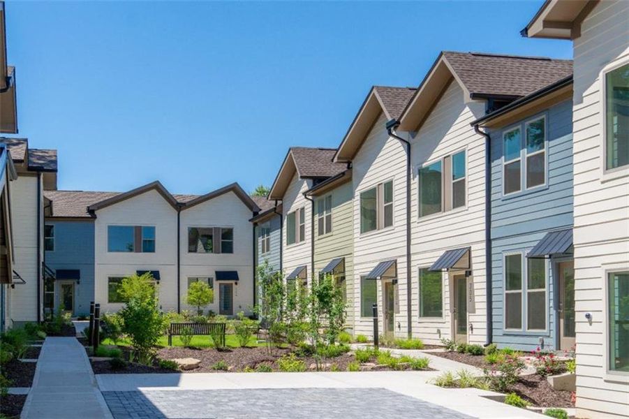 Front exterior of a new home in , Atlanta, GA, highlighting curb appeal (Image 15).