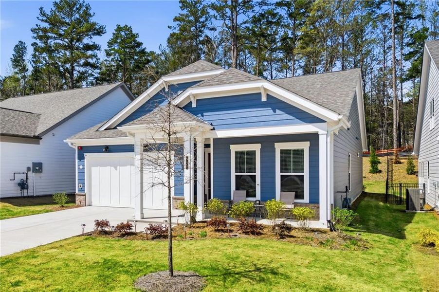 Front exterior of a new home in The Reserve at Bells Ferry, Kennesaw, GA, highlighting curb appeal (Image 2). Front exterior of a new home in The Reserve at Bells Ferry, Kennesaw, GA, highlighting curb appeal (Image 2).