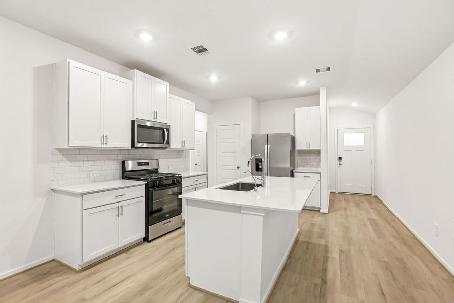 Furnished interior view inside a new home in Riviera Pines - Traditional Series, Conroe (Image 12).