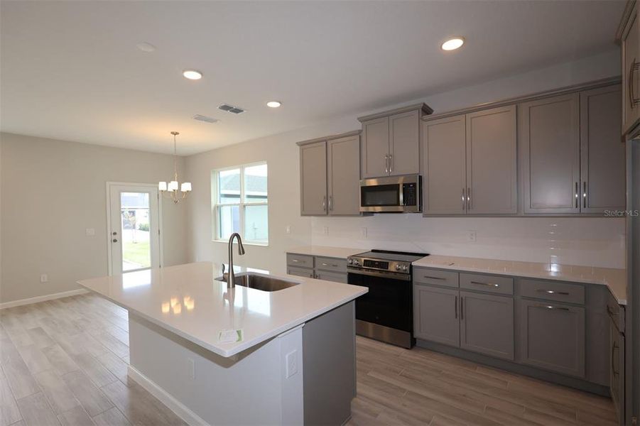 Furnished interior view inside a new home in Center Lake on the Park, St. Cloud (Image 7).