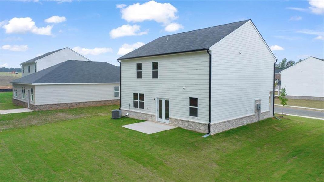 Exterior details and patio area of a home in The Reserve at Calcutta, Stockbridge (Image 3).