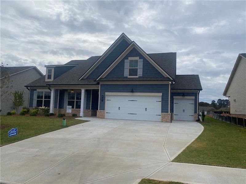 Front exterior of a new home in , Jefferson, GA, highlighting curb appeal (Image 31).