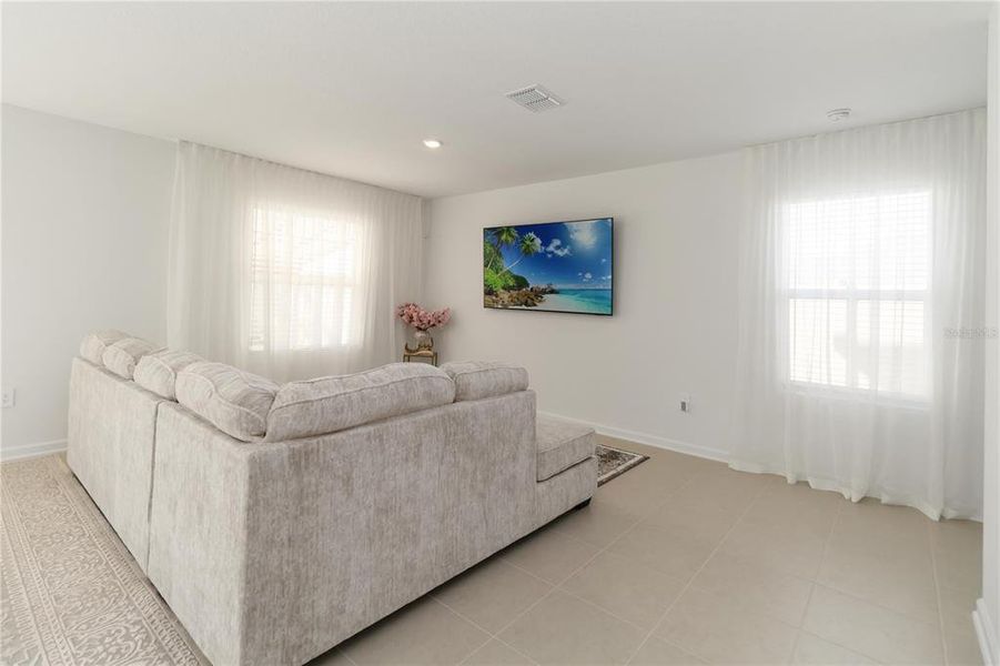 Furnished interior view inside a new home in Peace Creek Reserve: Manor Key Collection, Winter Haven (Image 11).