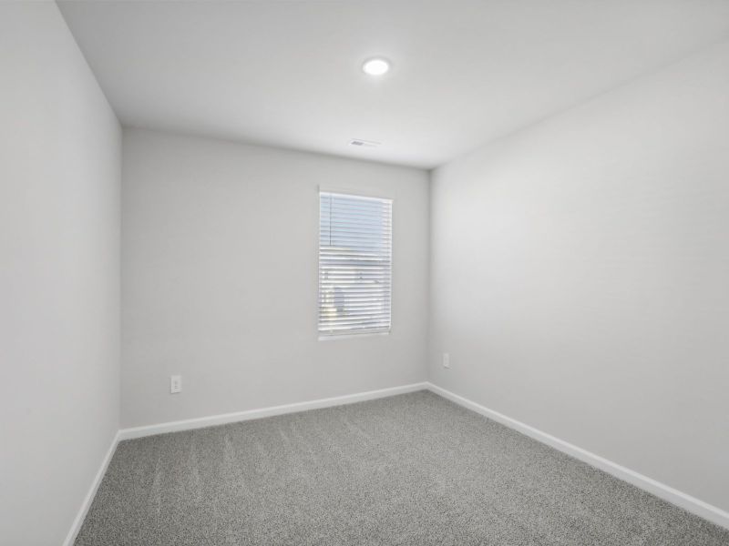 Secondary bedroom in the Chatham floorplan at 250 White Birch Lane in Angier, NC.